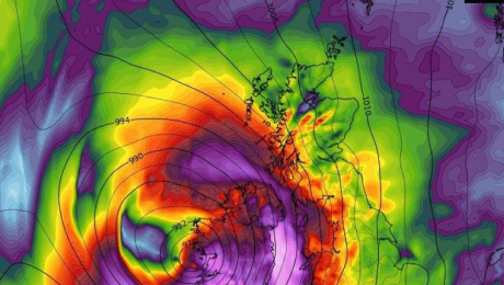Weather map showing a powerful storm system approaching the coastline with pressure lines and wind intensity colours.
